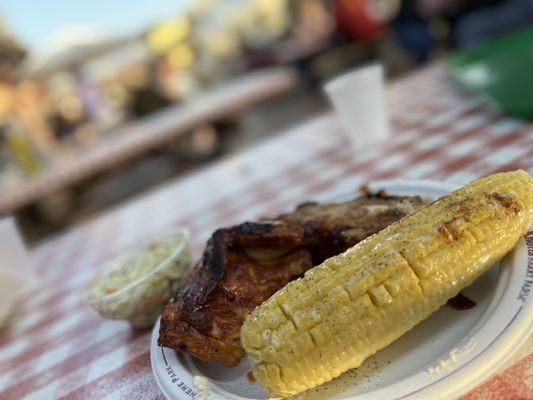 1/4 Chicken and Pork Rib combo comes w a side (corn on the cob)