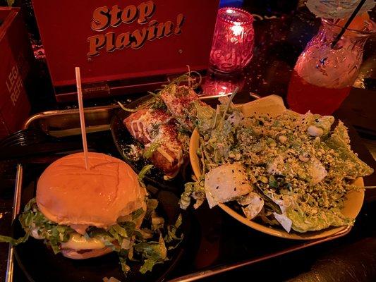 Private Island Cheeseburger, elote egg roll and Abe's House Salad