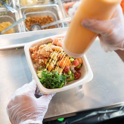 Spicy Mayo, Salmon, Tuna, Seaweed Salad, Ginger, Crispy Onions! Just some of the amazing options available when building your bowl/burrito.