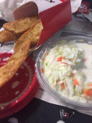 Coleslaw and potato wedges yummy