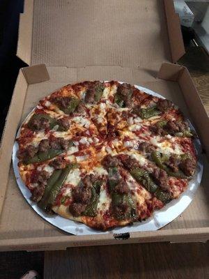 Thin crust green pepper, onion and sausage.