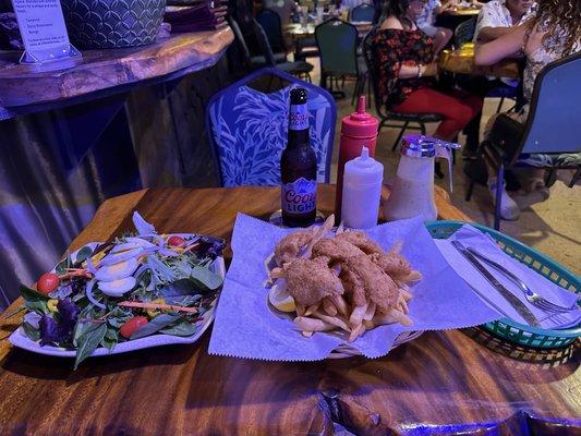 Fish & Chips ($18.00); Garden Salad ($16.00); 2x Coors Light ($11.00); tax $2.12 = $47.12 before gratuity