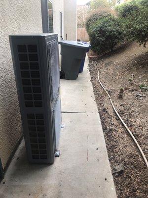 The tall AC unit that they recommended allowed us to keep the walkway on the side of the house accessible.