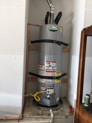 Installation of residential 40 gal. Water heater.