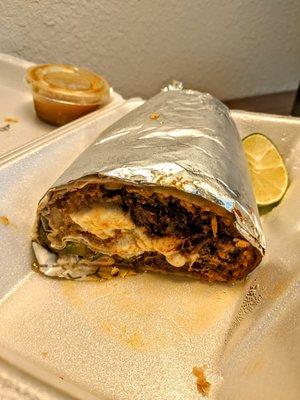 Barbacoa burrito. Could only finish half, it was so dense.