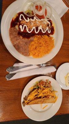 Cheese Enchiladas with Red Sauce, Spanish rice and refried beans. Crispy Beef Taco on the side