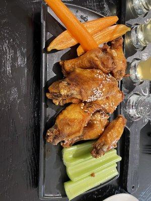 Chicken wings with sweet ginger bourbon sauce.