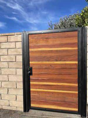 Back alley door. Metal frame and redwood.