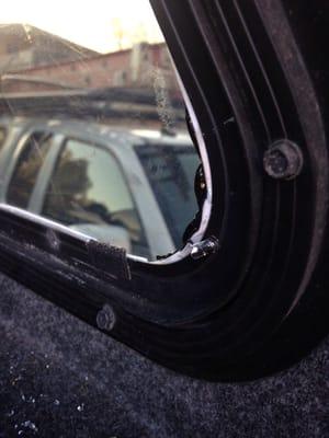 Screws sticking out and glass pieces left in the truck bed.