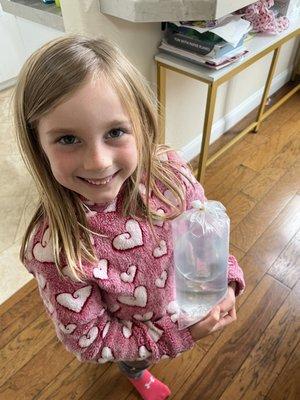 Our daughter, so happy & proud of her new fish 'babies'.