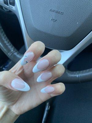 French manicure with little ghosts for Halloween over real nails, October 2022