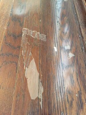 A piece of blue painters tape (designed to protect floors/paint) took our top coat right off! Pathetic quality!