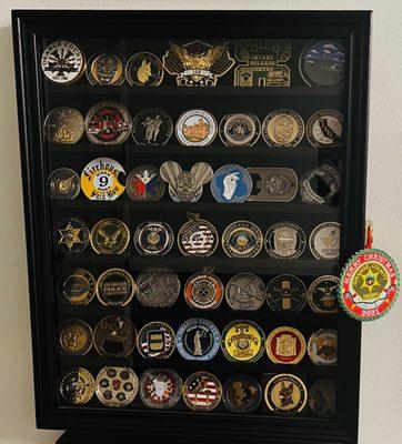 Challenge coin collection from police and fire fighter patients.