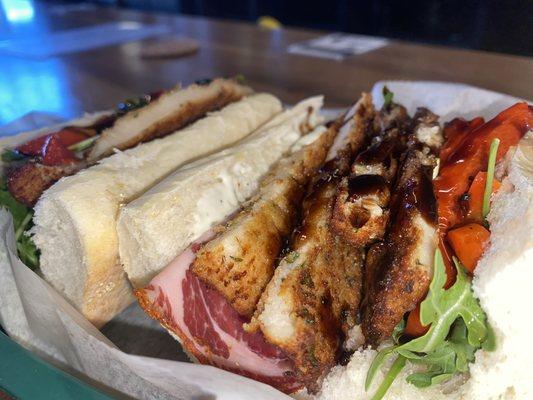 Chicken cutlet, hot "gabagool" capicola, roasted red bell peppers, arugula with lemon garlic aioli and balsamic glaze