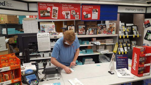 Austin At The Photo Department Front Counter