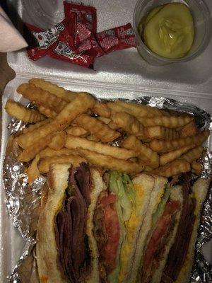 Pastrami Club Sandwich with fries and pickles. Very good! Came with lots of ketchup packets too.