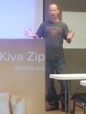 A guest from Kiva Zip during my Crowdfunding workshop. The projector screen is a good size.