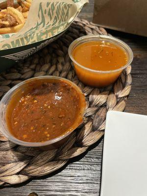 Watery Louisiana rub sauce (2nd sauce in the back) use to be thick just like all other sauces