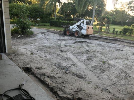 Smoothed our old driveway in prep.