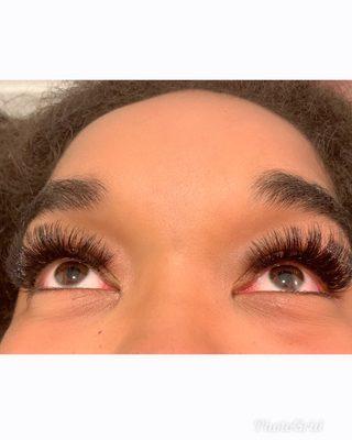 Long and full volume lashes by artist Amber