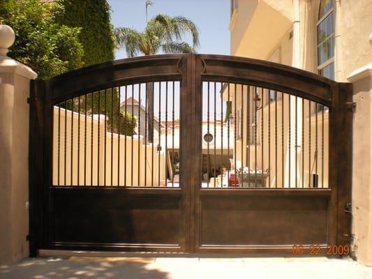 Custom wrought iron driveway gate