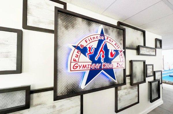 Custom interior impact wall for Gyminny Kids' Poway location.