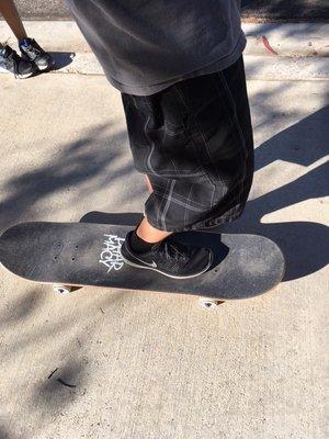 Pharmacy skateboard, my son's first ride, griptape is "Stacked" design.