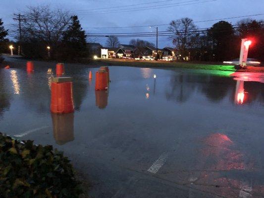 This photo was over the winter after a lot of rain before the pandemic. I thought the flooded parking lot looked kinda pretty.