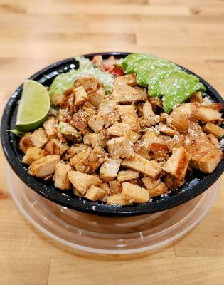 Chicken Bowl with Chipotle Sauce on the side.