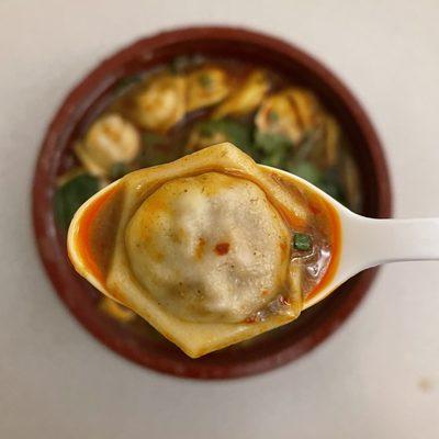 These ravioli style dumplings are actually ingenious.  Less labor intensive to make and are the perfect size to eat in 1 bite