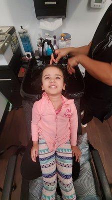 My 4 year old getting her hair washed and cut! ‍