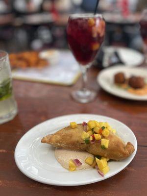 Chicken Empanada de Pollo with red sangria