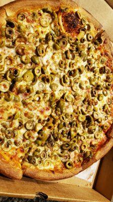 Green olives on pizza - salty and amazing!