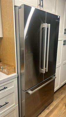 New high-end Bosch French door fridge with modern counter depth design that AL got us into at great discount