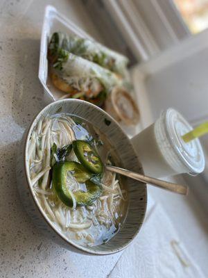 Chicken Pho soup, veggie spring rolls and coconut shake