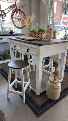 Kitchen island with 4 hide-a-way stools.