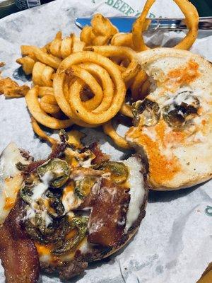 Amarillo firecracker burger With curly fries.