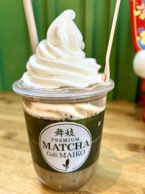 Calpico soft serve on hojicha latte