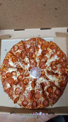 Pepperoni pizza with ranch sauce