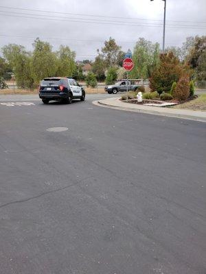 Cop parked on my street with another cop watching my house.