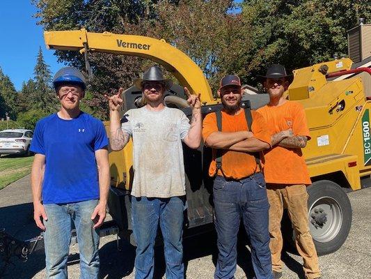 Work crew still smiling after a hard day's job (and yes, they all wore hard hats)