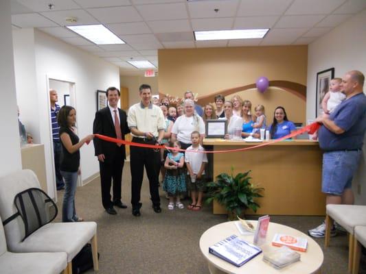 Cutting the tape on the new office!