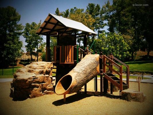 Tree log themed playground