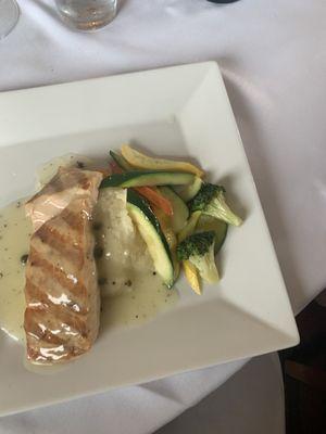 **GRILLED SALMON Griled salmon, capers, garlic, fresh herbs served in a white wine sauce