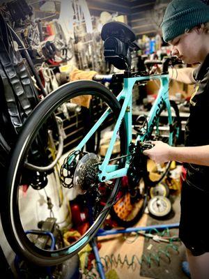 Our pro mechanic in deep concentration on this Bianchi carbon road bike tune up