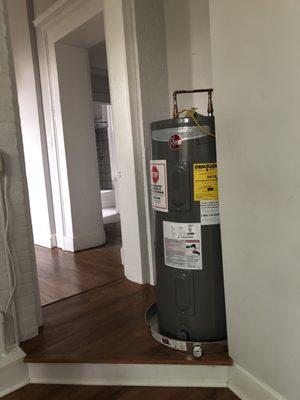 This enormous water heater that blocks the main entrance to the living room/bathroom and bedroom