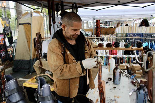 Ramiro of the Way of the Hand working leather.