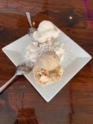 Cannoli with one end tiramisu gelato and the other coconut.