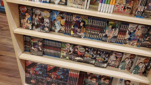 shonen jump aisle; this shelf's dedicated to kny/demon slayer