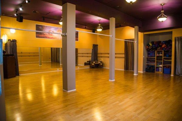 Studio space includes option for a wall of mirrors, hanging bars, and the use of double bar walls.